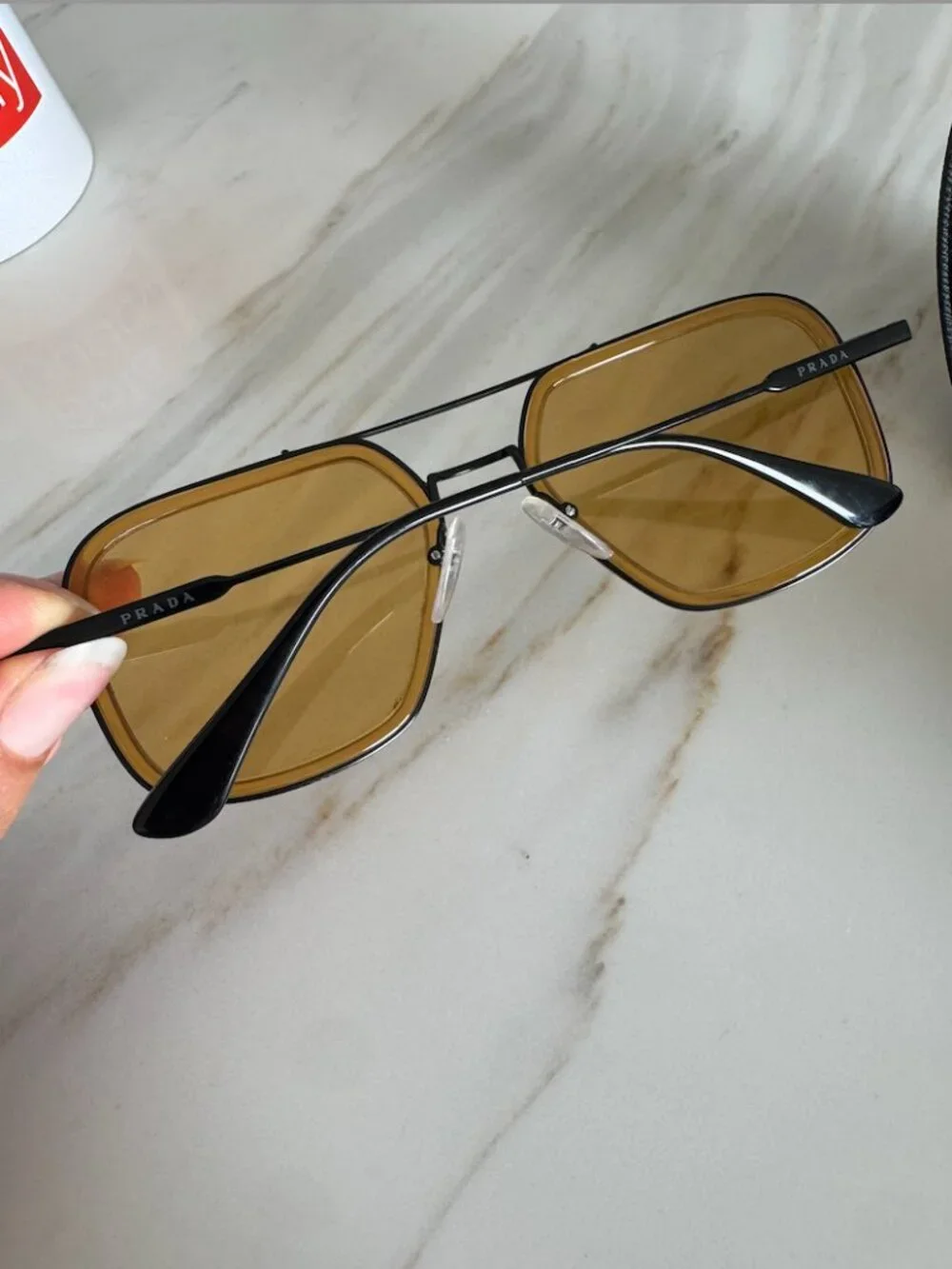 Prada Black + Yellow Aviator Sunglasses SPR 57X